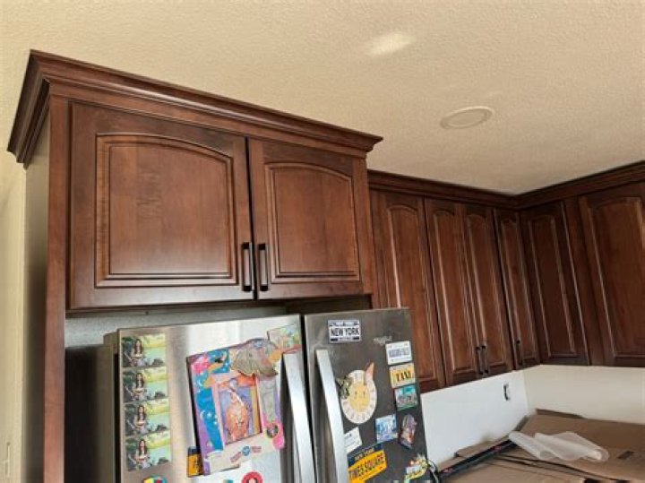 Quick Answer: Should I Put My Kitchen Cabinets To The Ceiling??